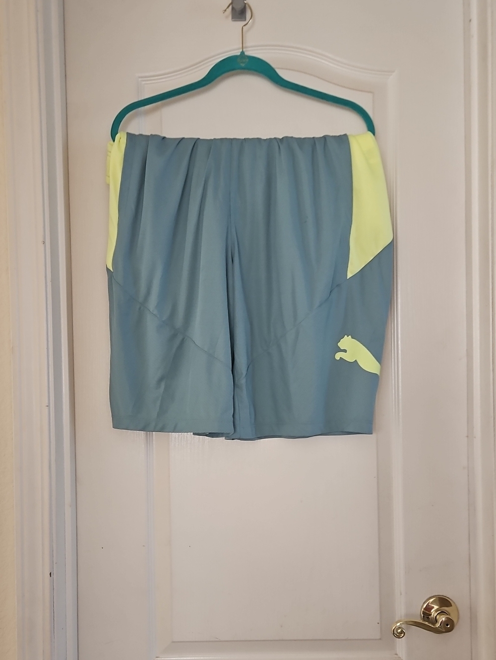 Puma Teal Shorts with Neon Yellow Accents